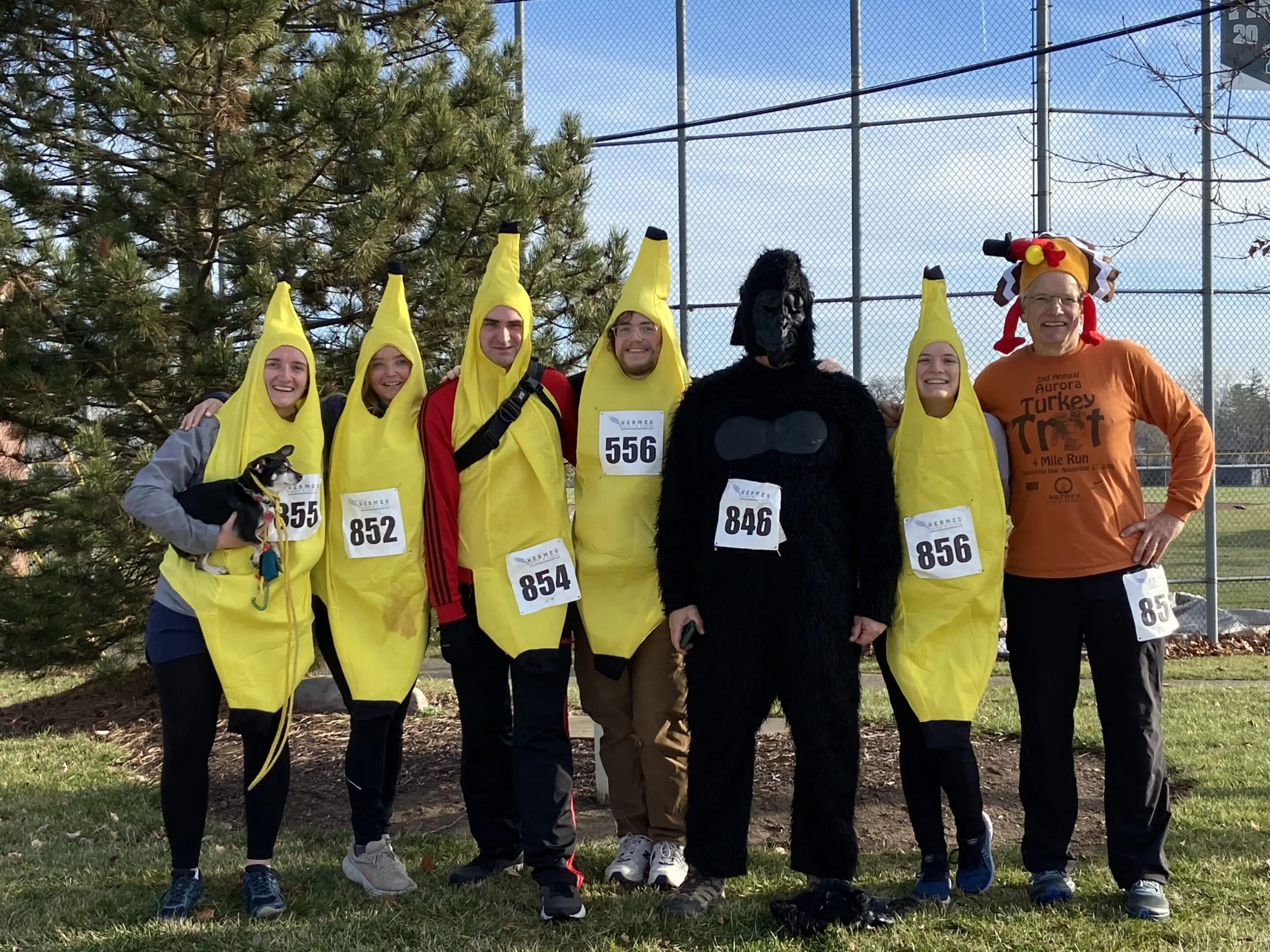 A group of people dressed as bananas and wearing costumes.